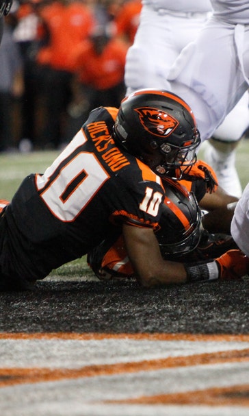 Oklahoma State opens with 52-36 victory over Oregon State